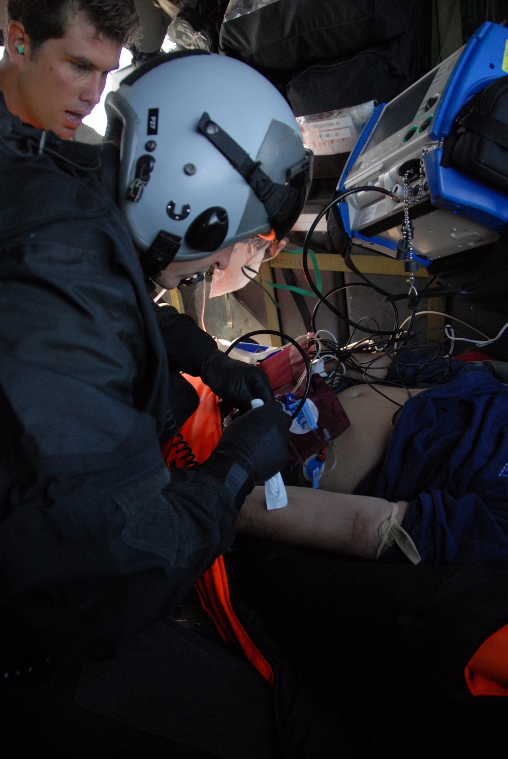 Pararescuemen treat patient