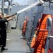 USS Farragut sailor conducts washdown