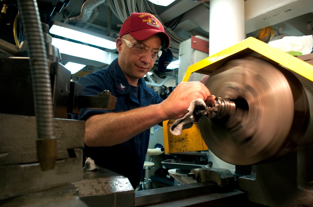 USS Fitzgerald sailor at work