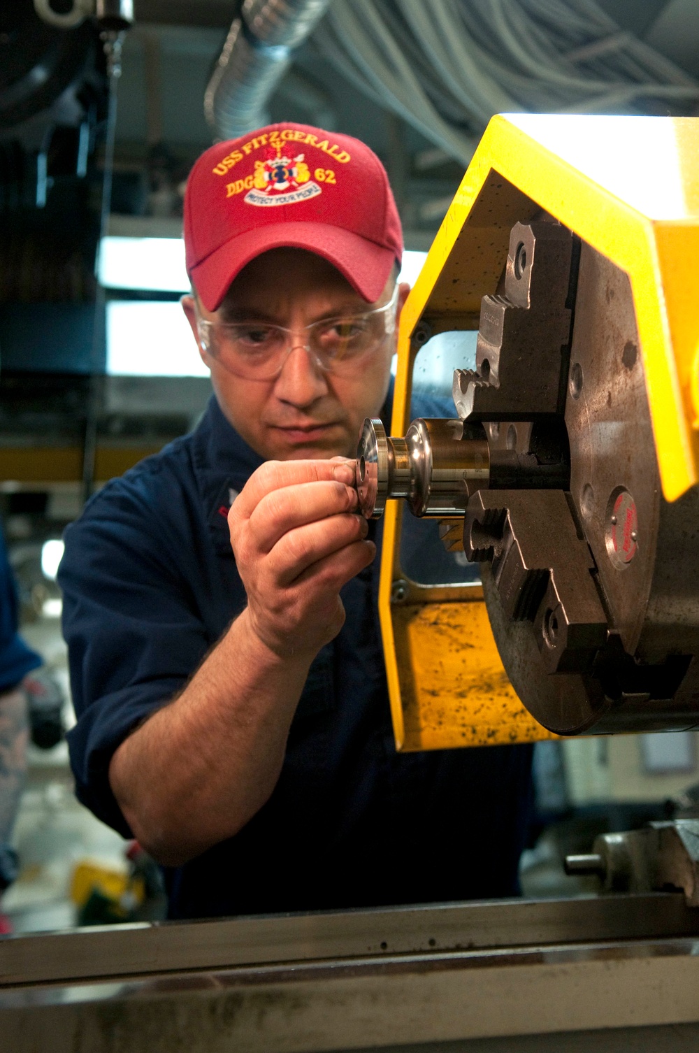 USS Fitzgerald sailor at work