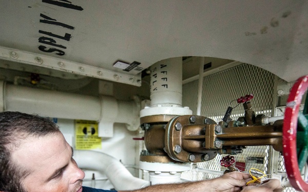 USS Porter sailor at work