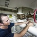USS Porter sailor at work