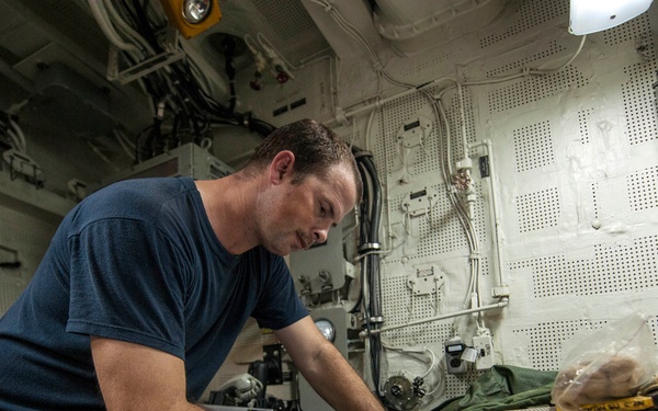USS Porter sailor at work