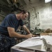 USS Porter sailor at work
