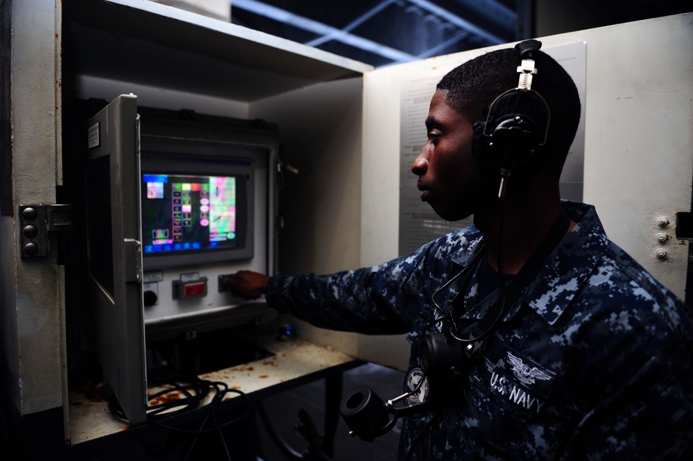 USS George H.W. Bush sailors at work