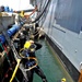 SWRMC divers conduct maintenance on USS Boxer