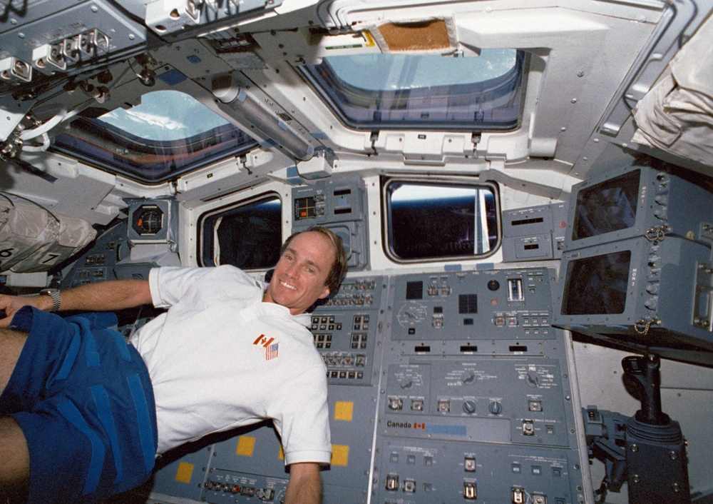 Crewmember in the aft flight deck.