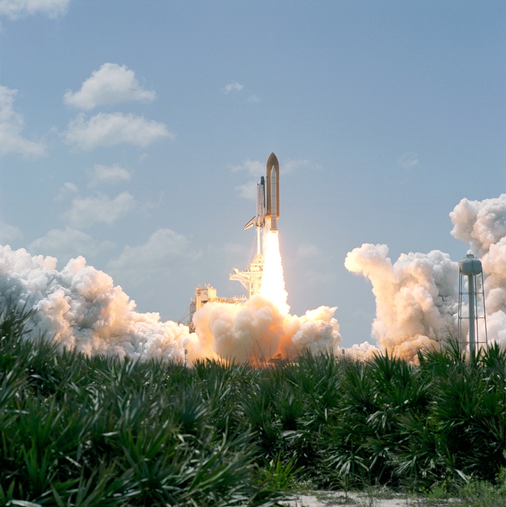 View of the launch of the Space Shuttle Endeavour at KSC to start the STS-100 mission