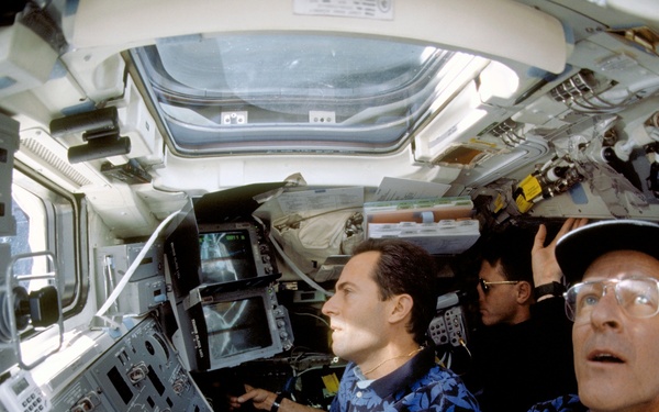 Various view with fish-eye lens of STS-103 crew on aft flight deck