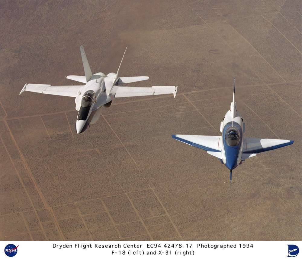 X-31 in Flight with F-18 Chase