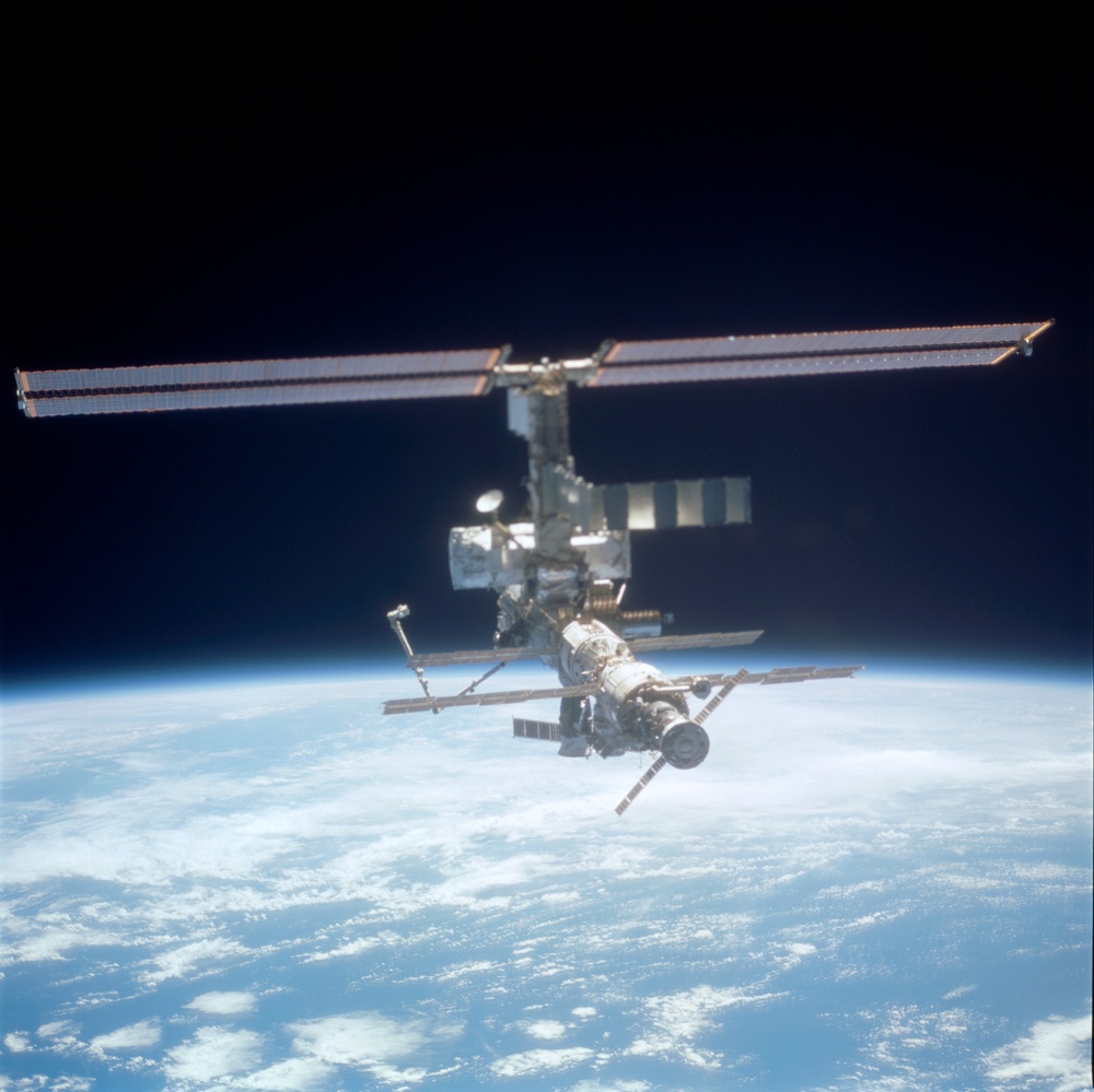 Distant view of the aft - zenith side of the ISS taken during STS-110's flyaround