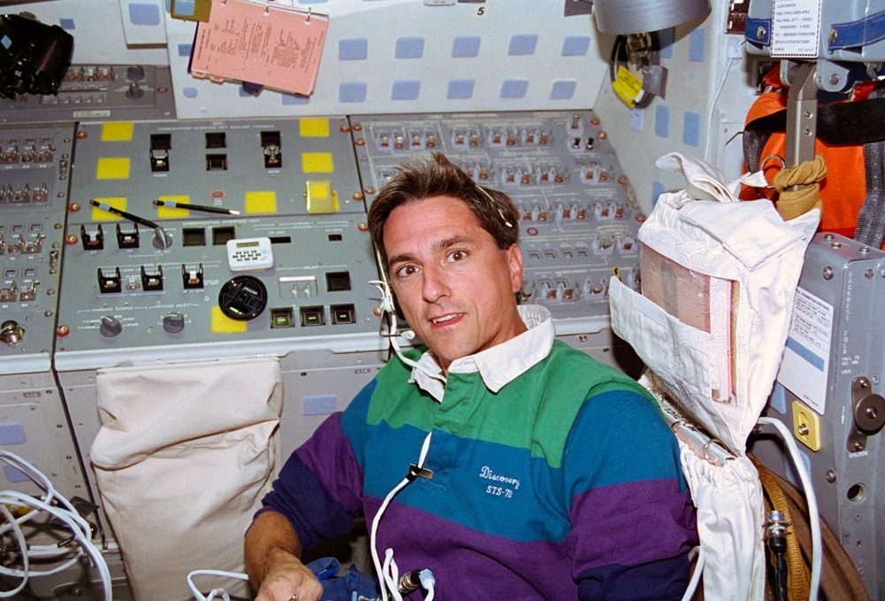Portrait-like view of Mission Specialist Donald A. Thomas in flight deck