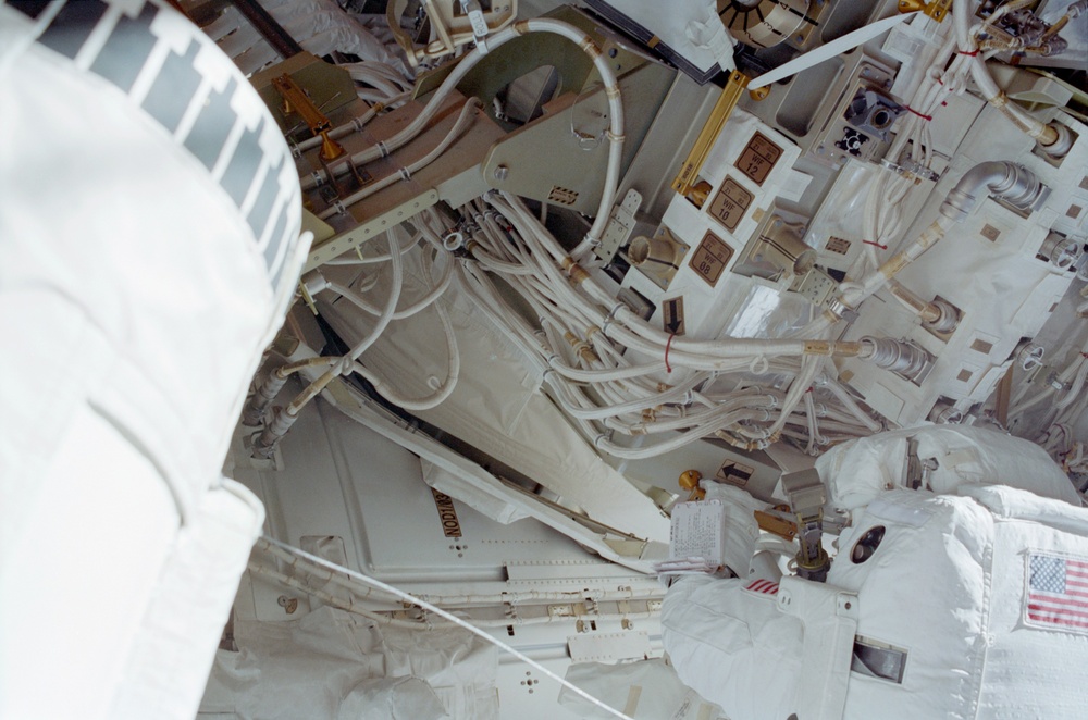 MS Tani secures Circuit Interrupt Devices on the Z1 Truss during STS-108's EVA