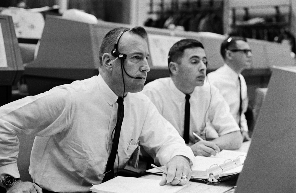 Gemini 8 spacecraft communicators James A. Lovell Jr and William A. Anders in the MCC