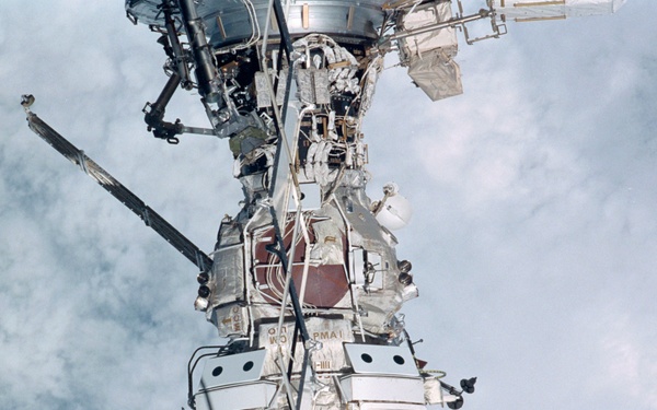 Exterior view of ISS during flyaround by STS-105 showing FGB and PMA1