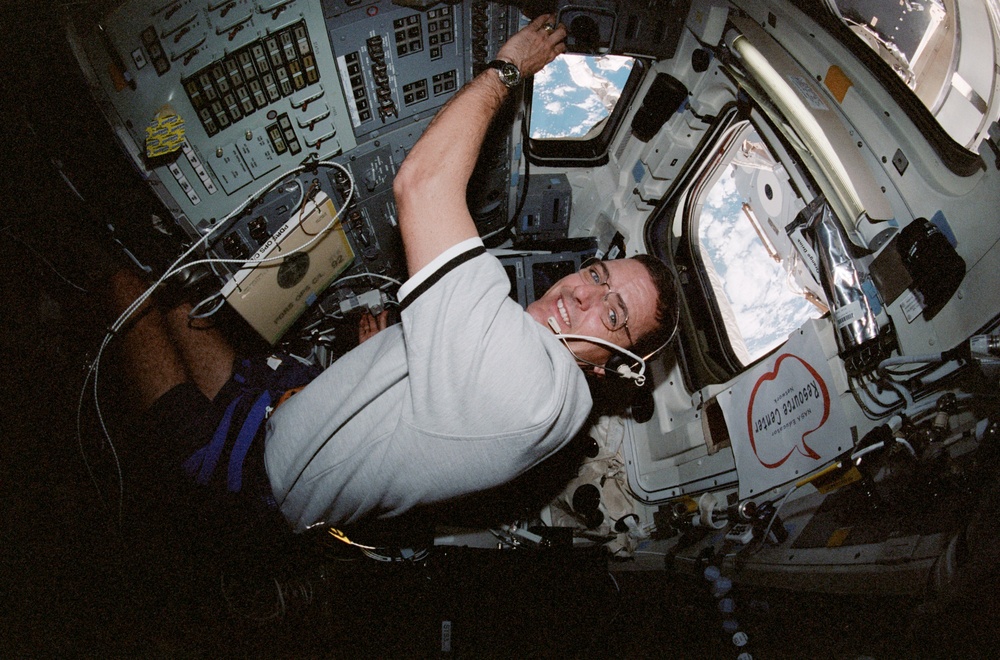 McArthur poses at aft flight deck; McArthur and Chiao at aft flight deck
