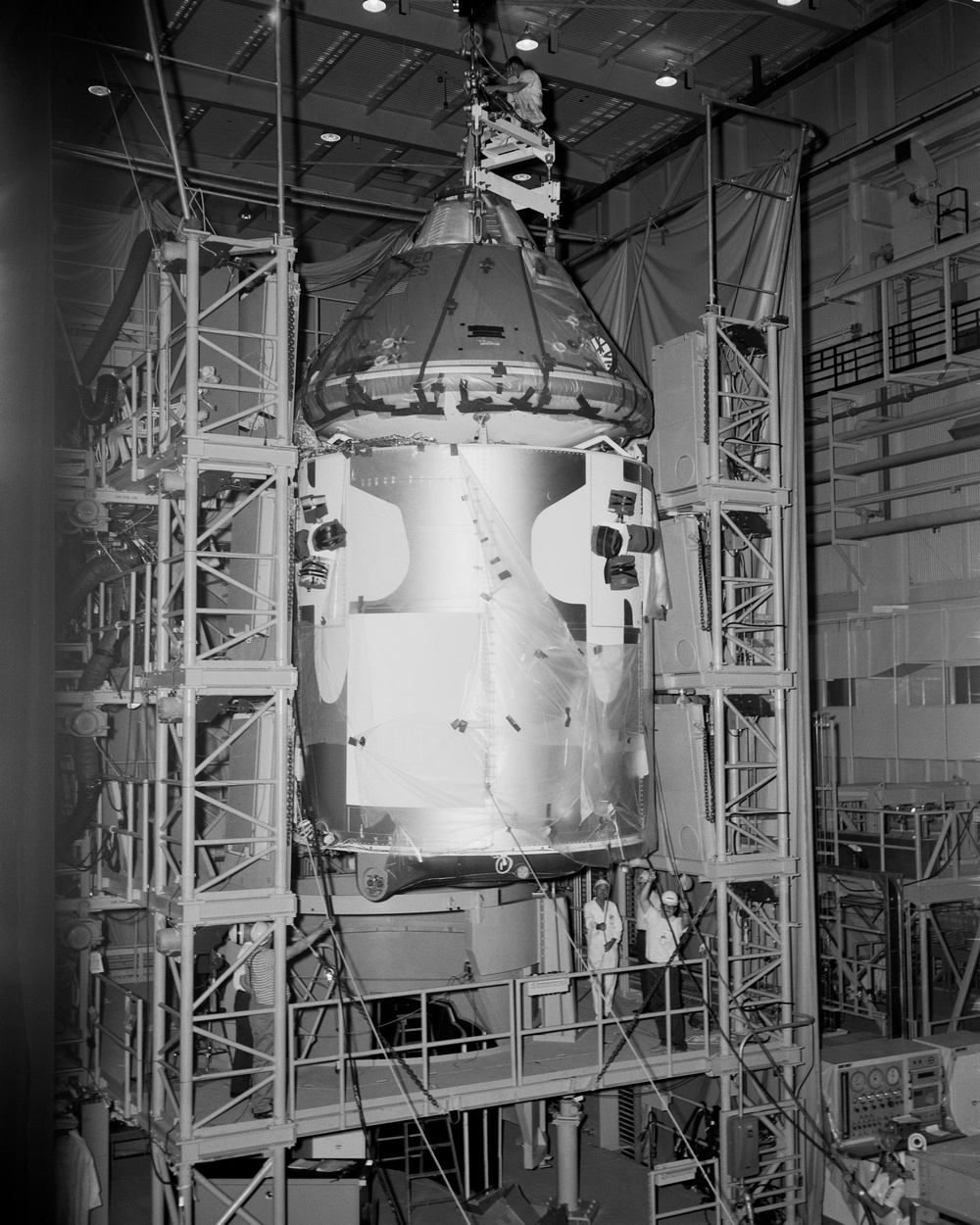 Spacecraft and work stand installation bldg. 32 Chamber ''A''