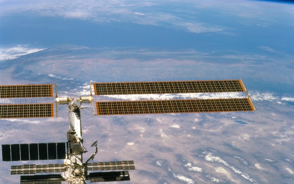 Forward view of the ISS taken during the final flyaround of the STS-100 mission