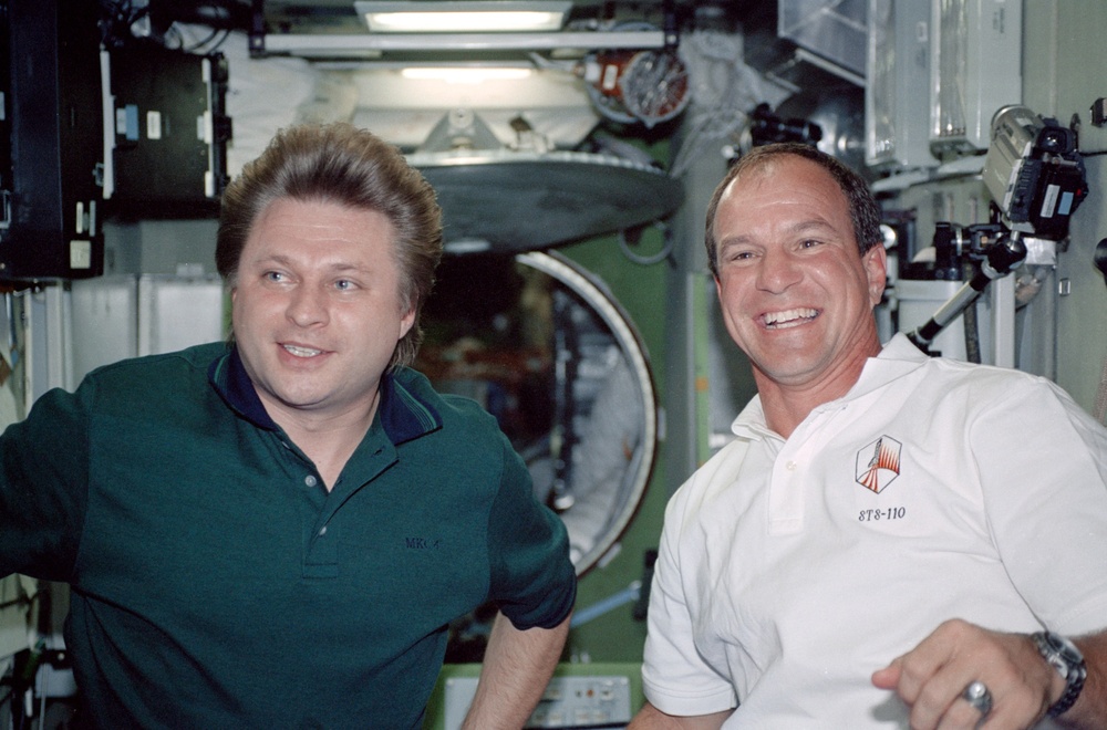 Bloomfield and Onufrienko pose in the Service Module during STS-110