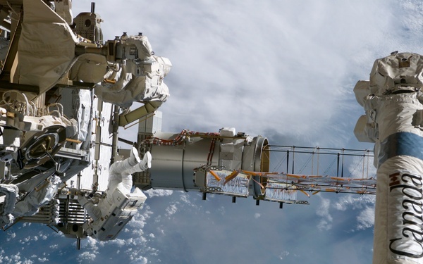 STS-115 MS Stefanyshyn-Piper releases PVR cinches and winch PIP pins on the P3/P4 Truss during EVA