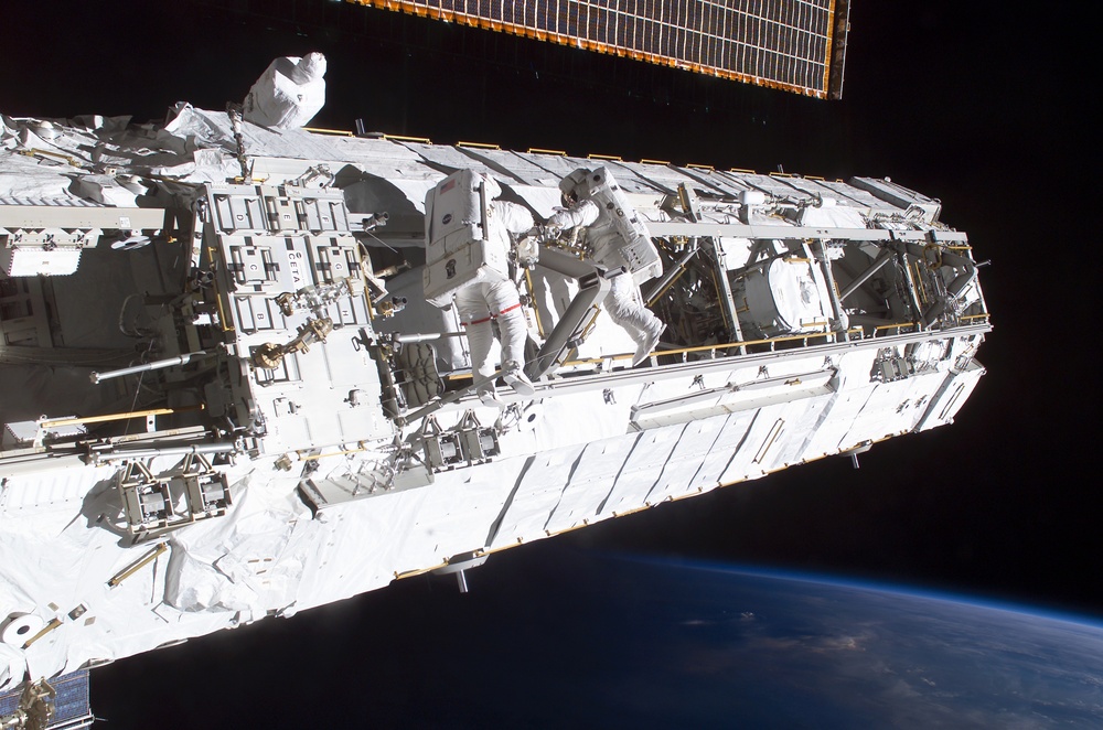 MS Lopez-Alegria and MS Herrington Keel Trunnion Pin OPS on P1 Truss during second EVA for STS-113