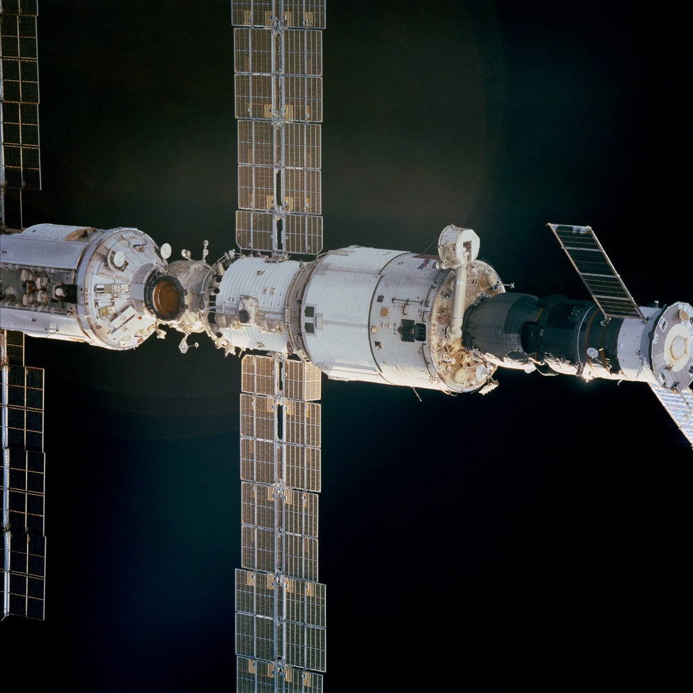 View of Zvezda, Zarya and Progress during the initial fly around of STS-106