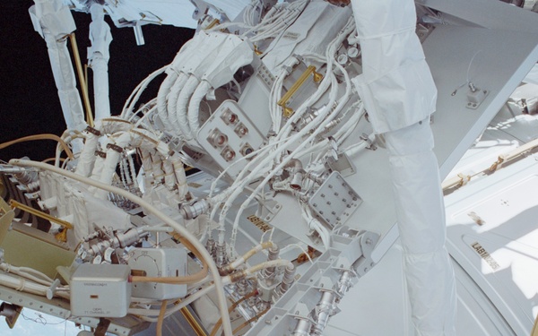 View of the aft avionics tray between the Z1 and S0 Trusses taken during the fourth EVA of STS-110