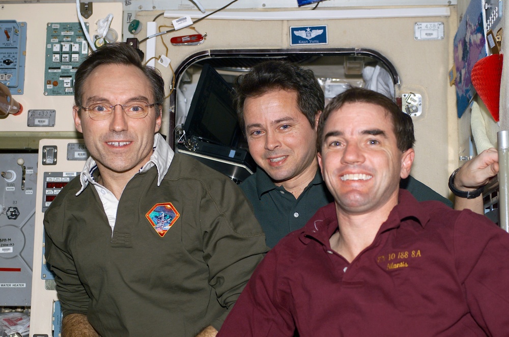 Walz, Bursch and Walheim pose in Zvezda during STS-110's visit to the ISS