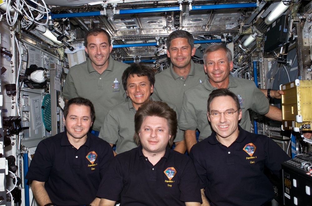 STS-111 UF-2 and Expedition Four crews group portrait in U.S. Lab
