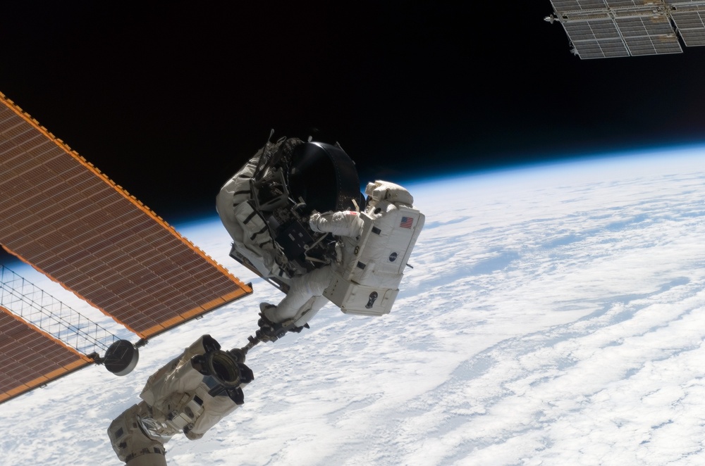 View of MS Williams transporting the new CMG during EVA 2