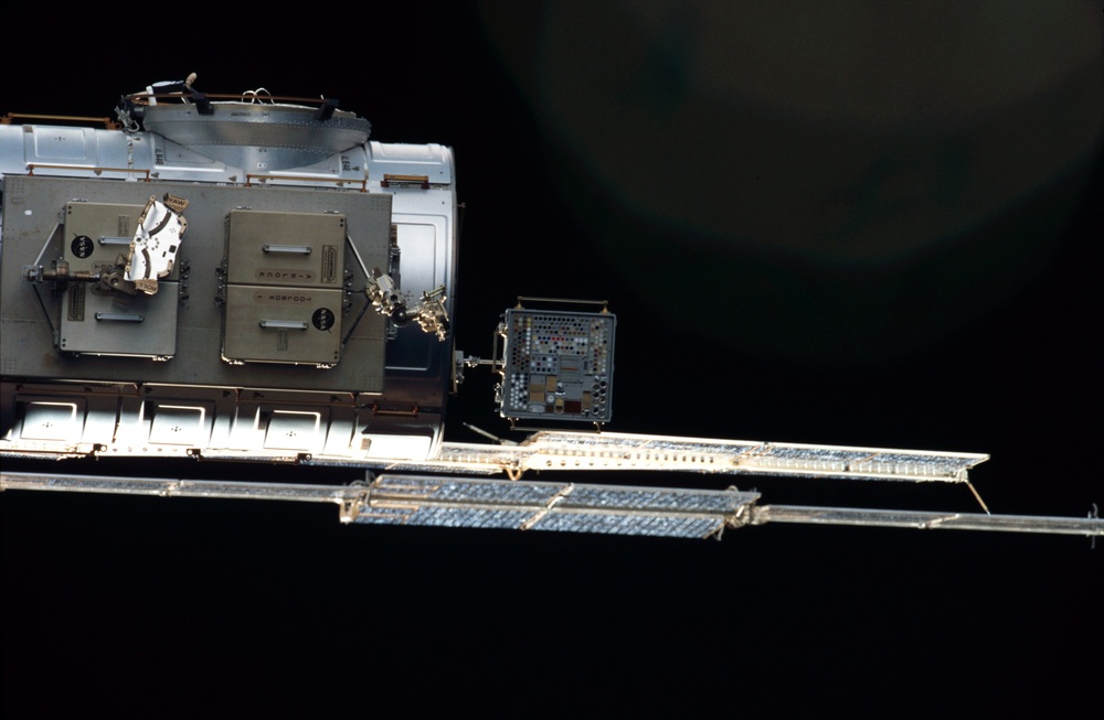 View of the starboard solar arrays for the FGB and Service Module taken during STS-110