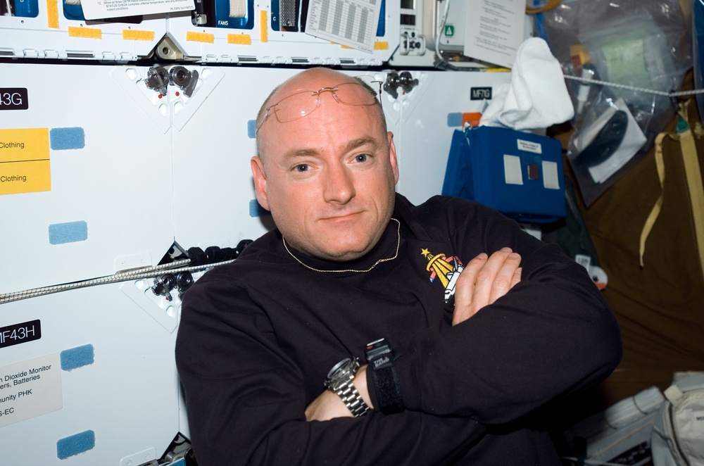 View of Kelly posing for a photo in the MDDK during STS-118