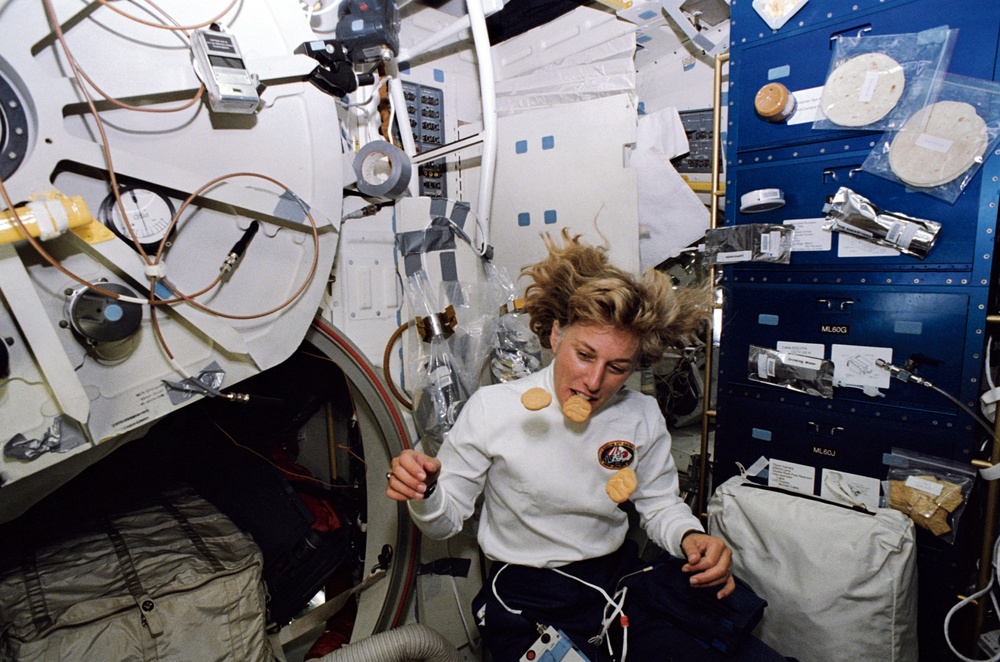 MS N. Jan Davis on middeck and flight deck of orbiter