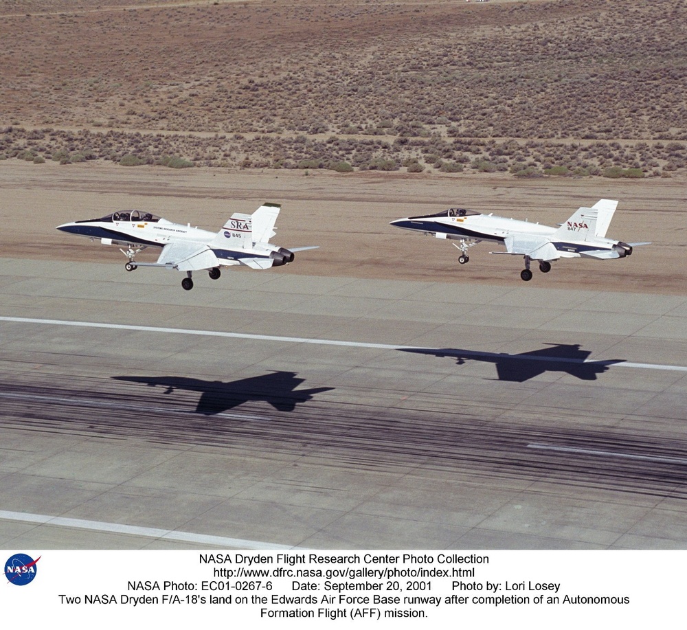 Two NASA Dryden F/A-18's land on the Edwards Air Force Base runway after completion of an Autonomous