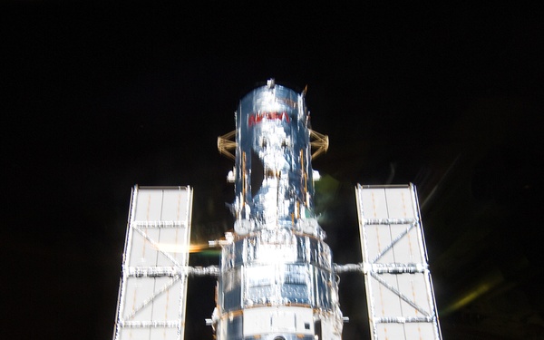 View of HST berthed in Atlantis' Payload Bay