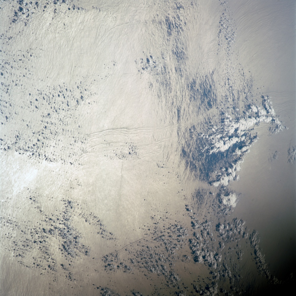 Earth observation image of internal waves taken during STS-100