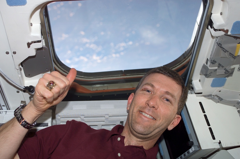 Husband gives a 'thumbs up' from Columbia's AFD during STS-107