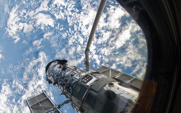 Hubble Space Telescope (HST) during rendezvous with STS-125 Shuttle Atlantis