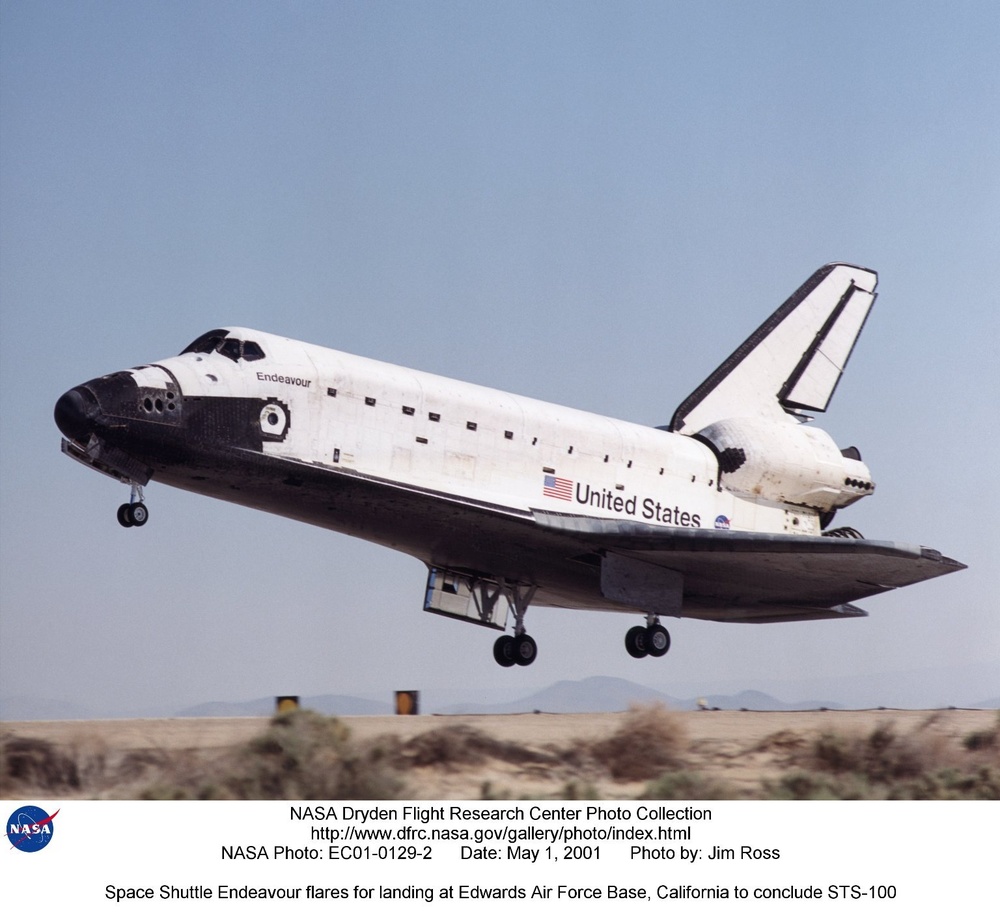 Space Shuttle Endeavour flares for landing at Edwards Air Force Base, California to conclude STS-100
