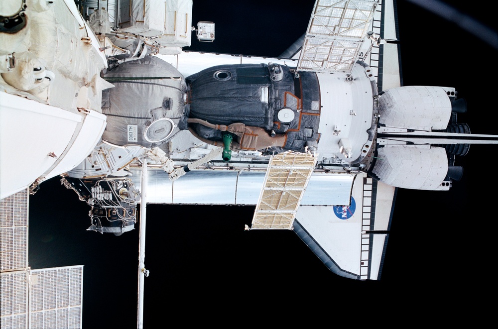 View of the Soyuz and Atlantis' payload bay taken during STS-110's visit to the ISS