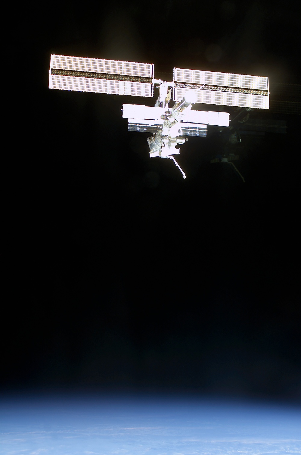 The aft side of the ISS taken during the STS-108 undocking and flyaround