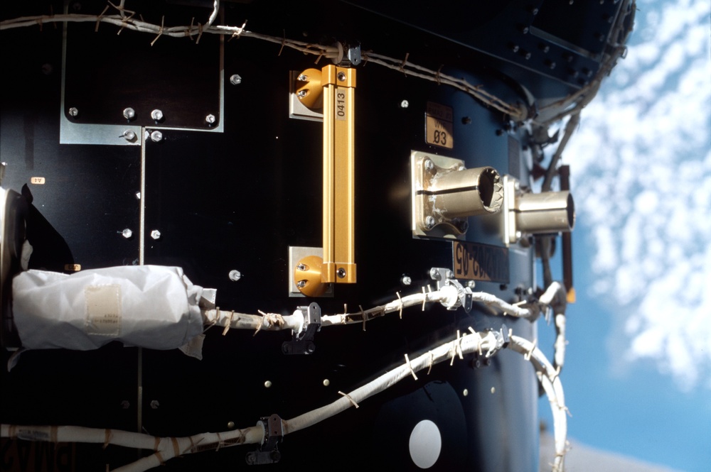 Panel PMA2/02-05 with EVA handrail 413 and WIF 03 taken during STS-100