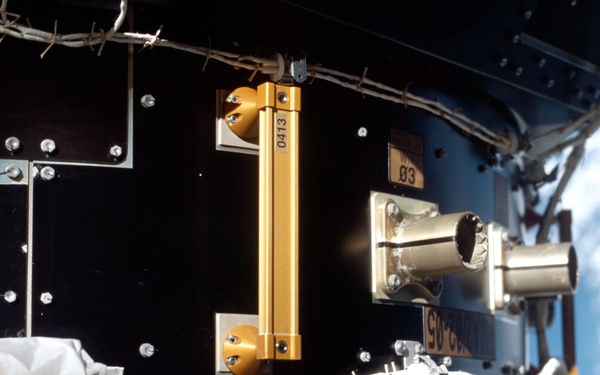 Panel PMA2/02-05 with EVA handrail 413 and WIF 03 taken during STS-100