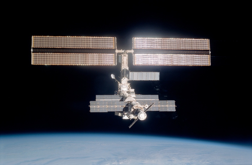 Aft - zenith view of the ISS taken after STS-108's undocking