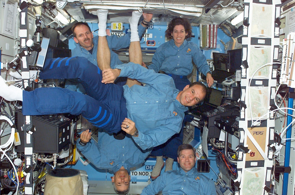 Morin, Smith, Ochoa, Frick and Bloomfield pose in Destiny during STS-110's visit to the ISS