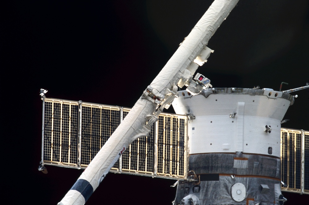 View of the SSRMS and Soyuz Spacecraft taken during STS-110