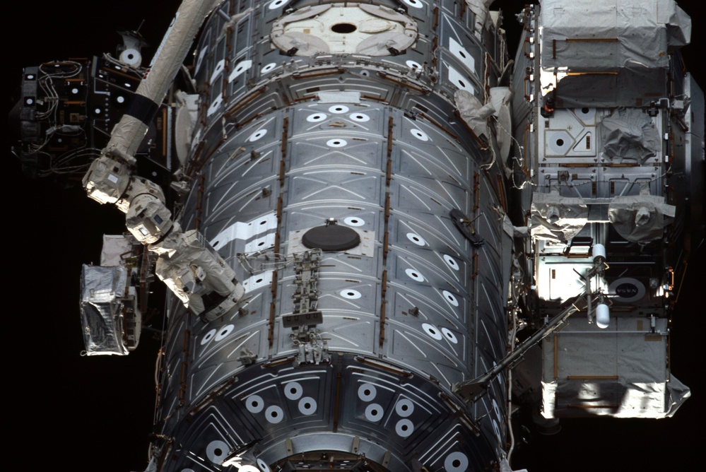 View of the nadir side of the U.S. Lab, Node 1, Airlock and SSRMS taken during STS-110