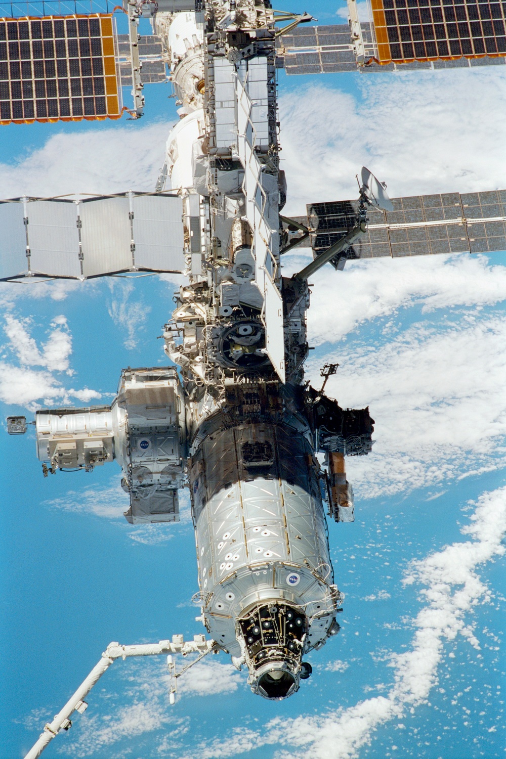 The zenith - forward side of the ISS taken during the STS-108 undocking and flyaround