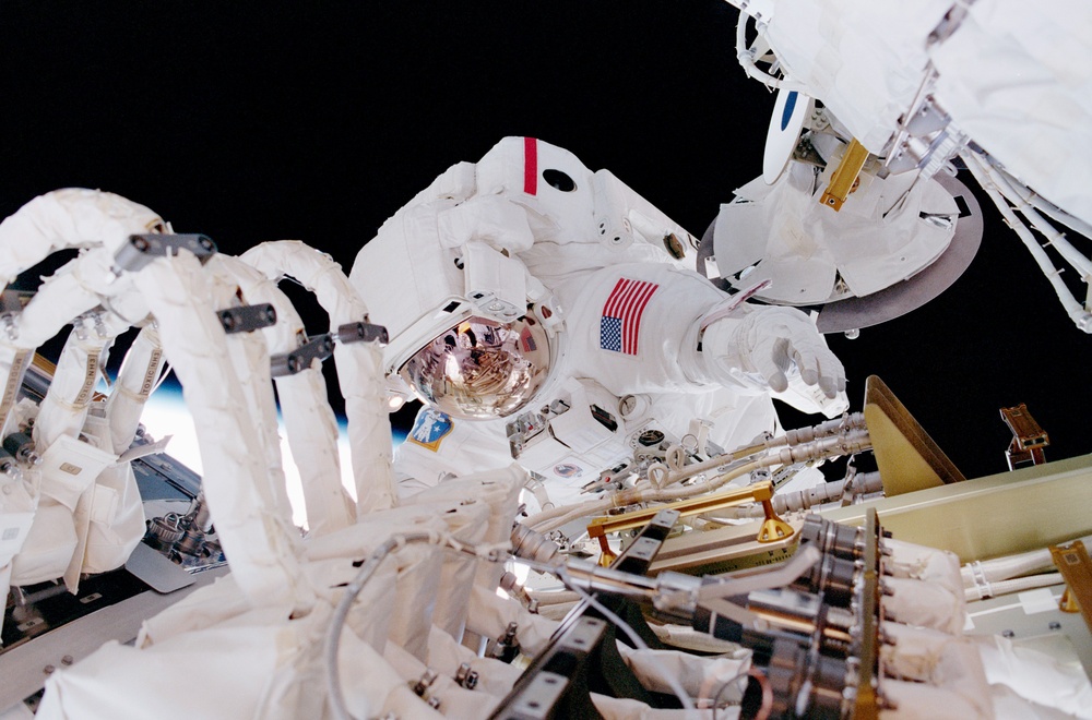 MS Jones installs cables and connectors on U.S. Laboratory / Destiny Module