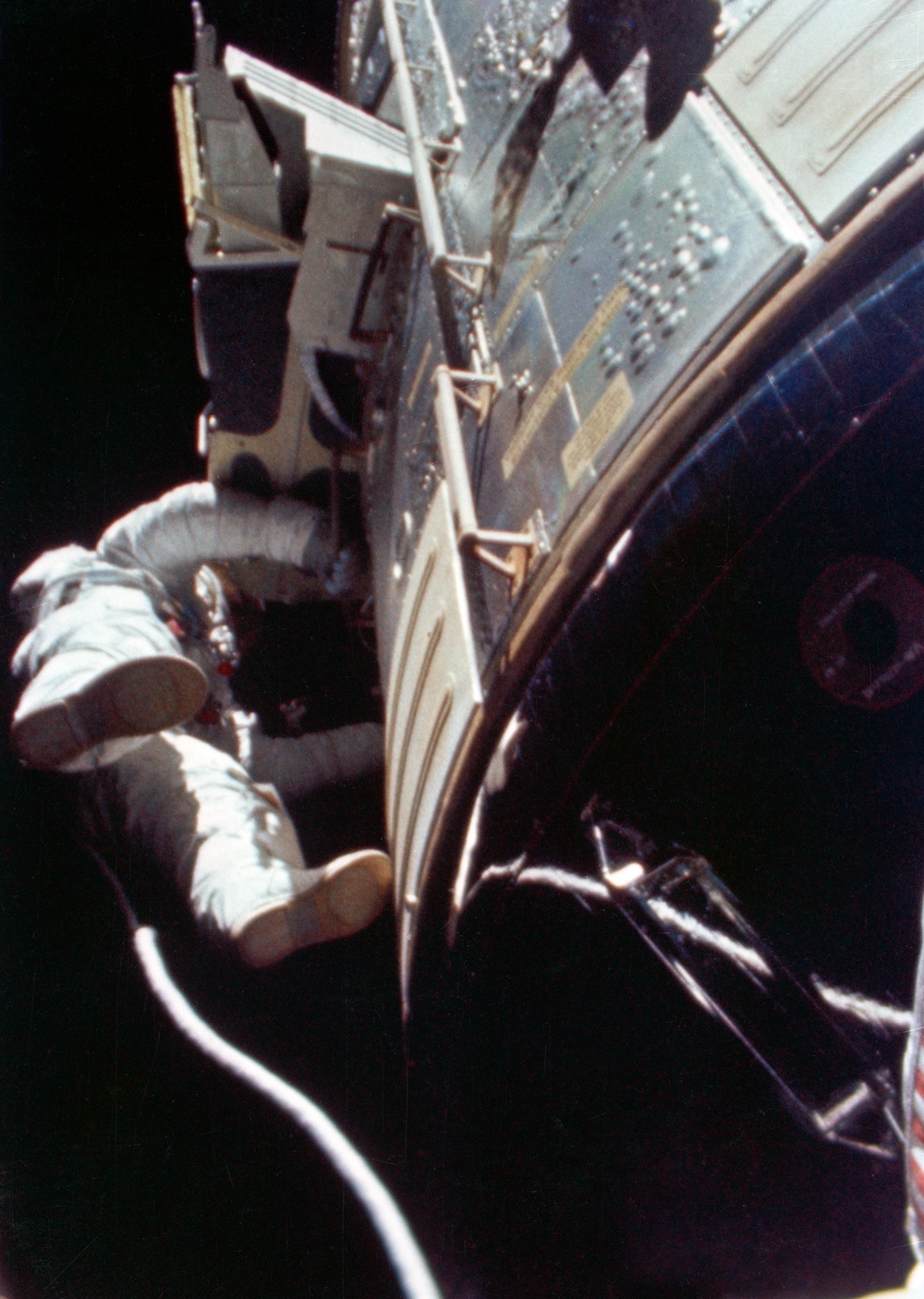 Astronaut Alfred Worden floats in space outside spacecraft during EVA
